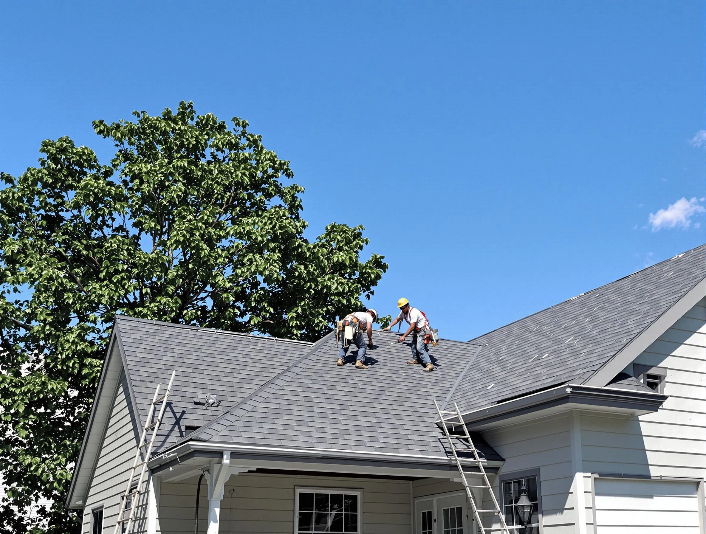 Akron Roofing Company crew finalizing a roof installation in Akron, OH
